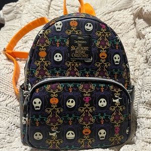 Loungefly mini backpack purse GENTLY USED. MAKE AN OFFER!!